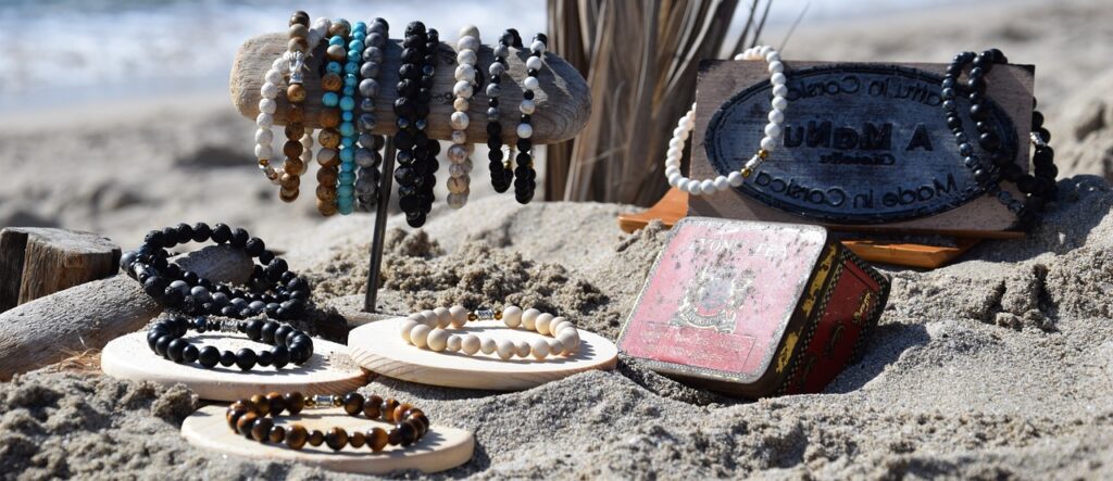 Bracelets on beach.